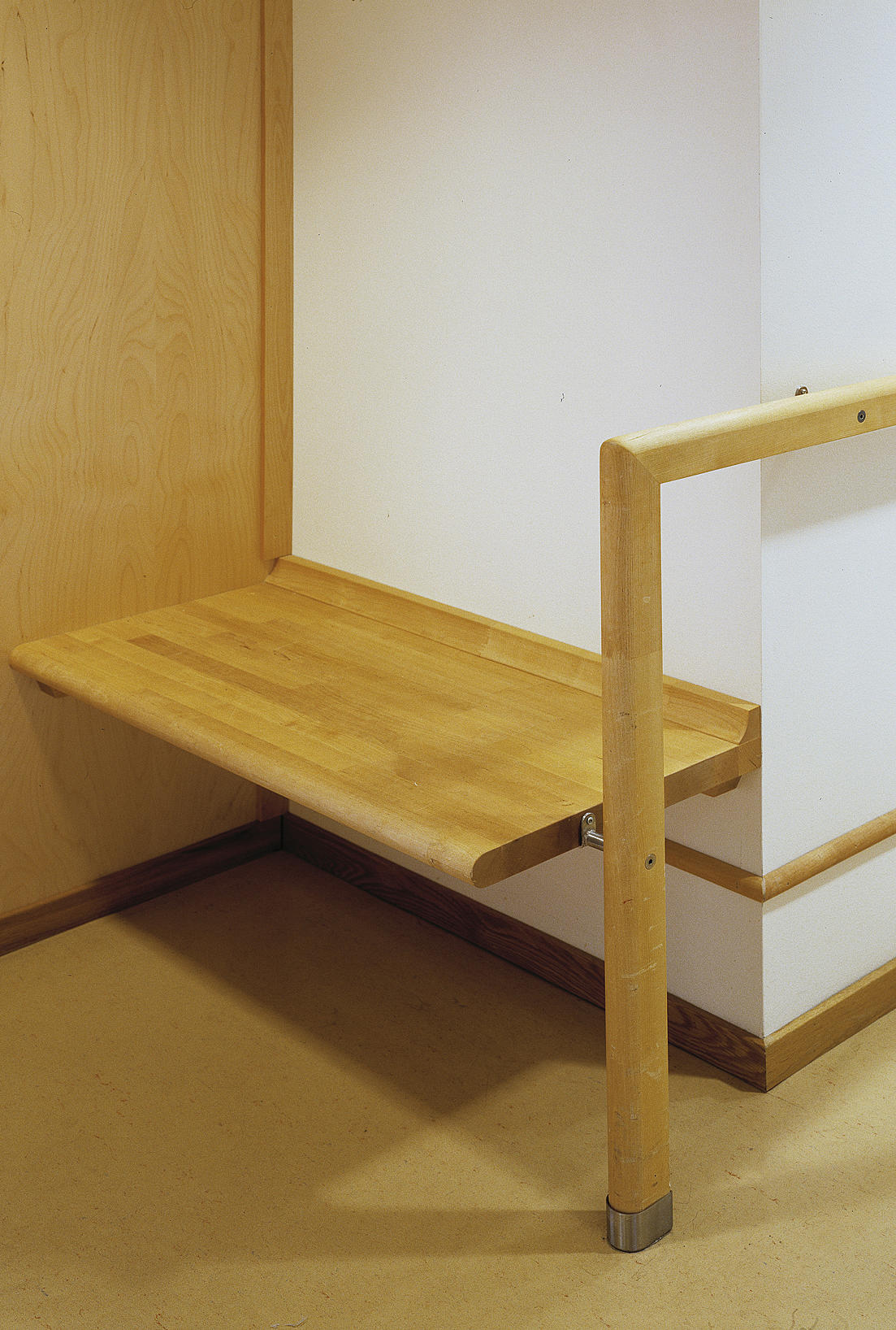 Sitteplass i korridor.