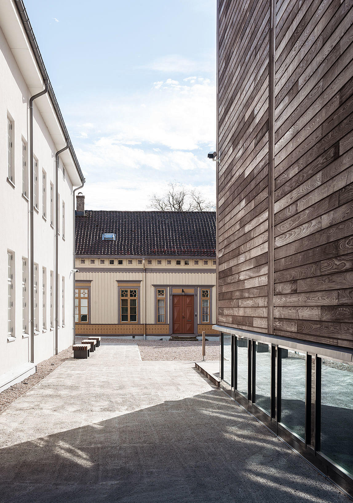 Øvre tun med eksisterende bygg og det nye museet.